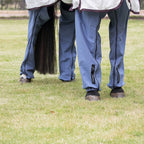 Close up of horse legs in ocean coloured Canterpants