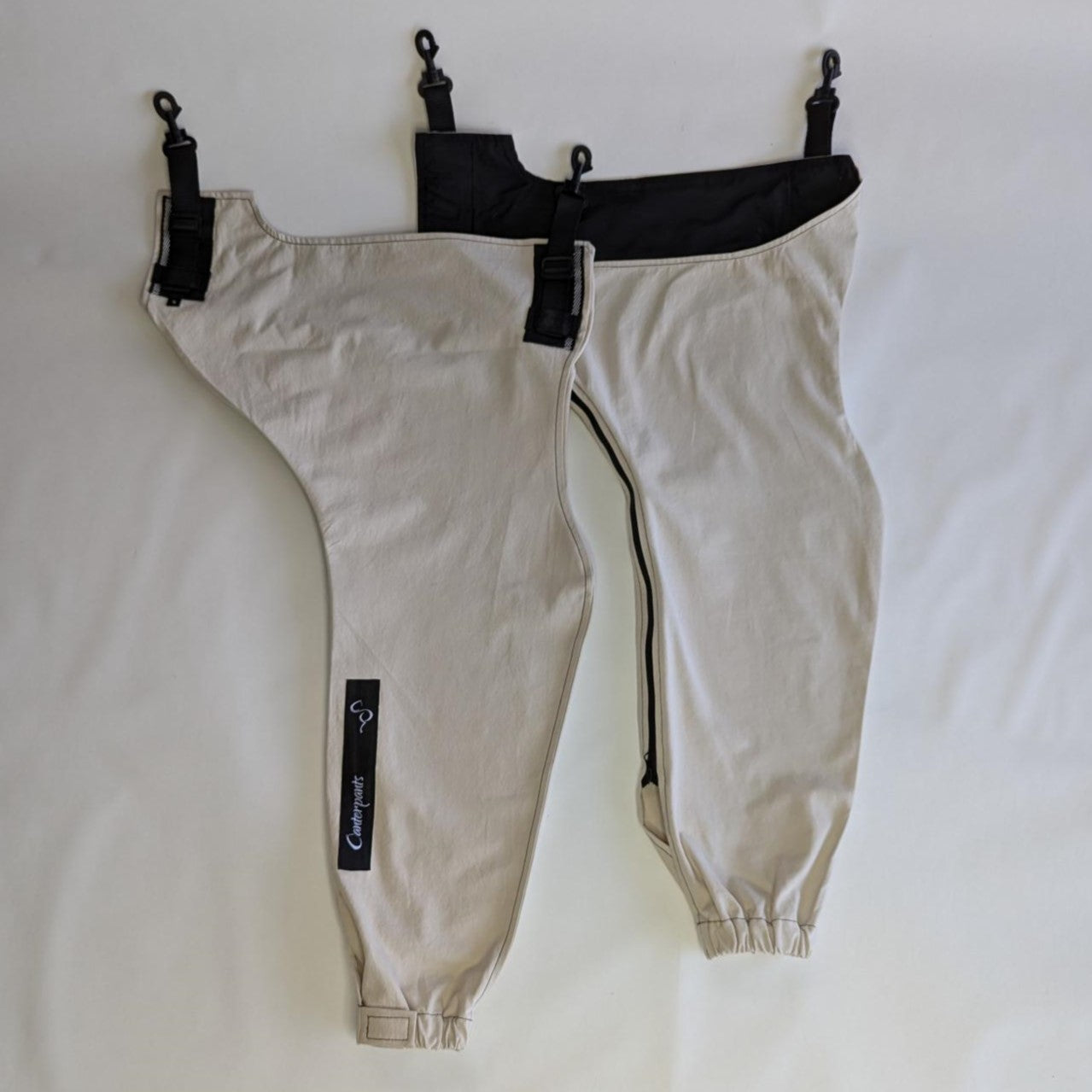 Small pair of beach coloured hind leg Canterpants on white background